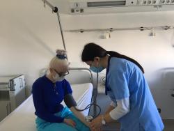 Ketjona works with a patient
