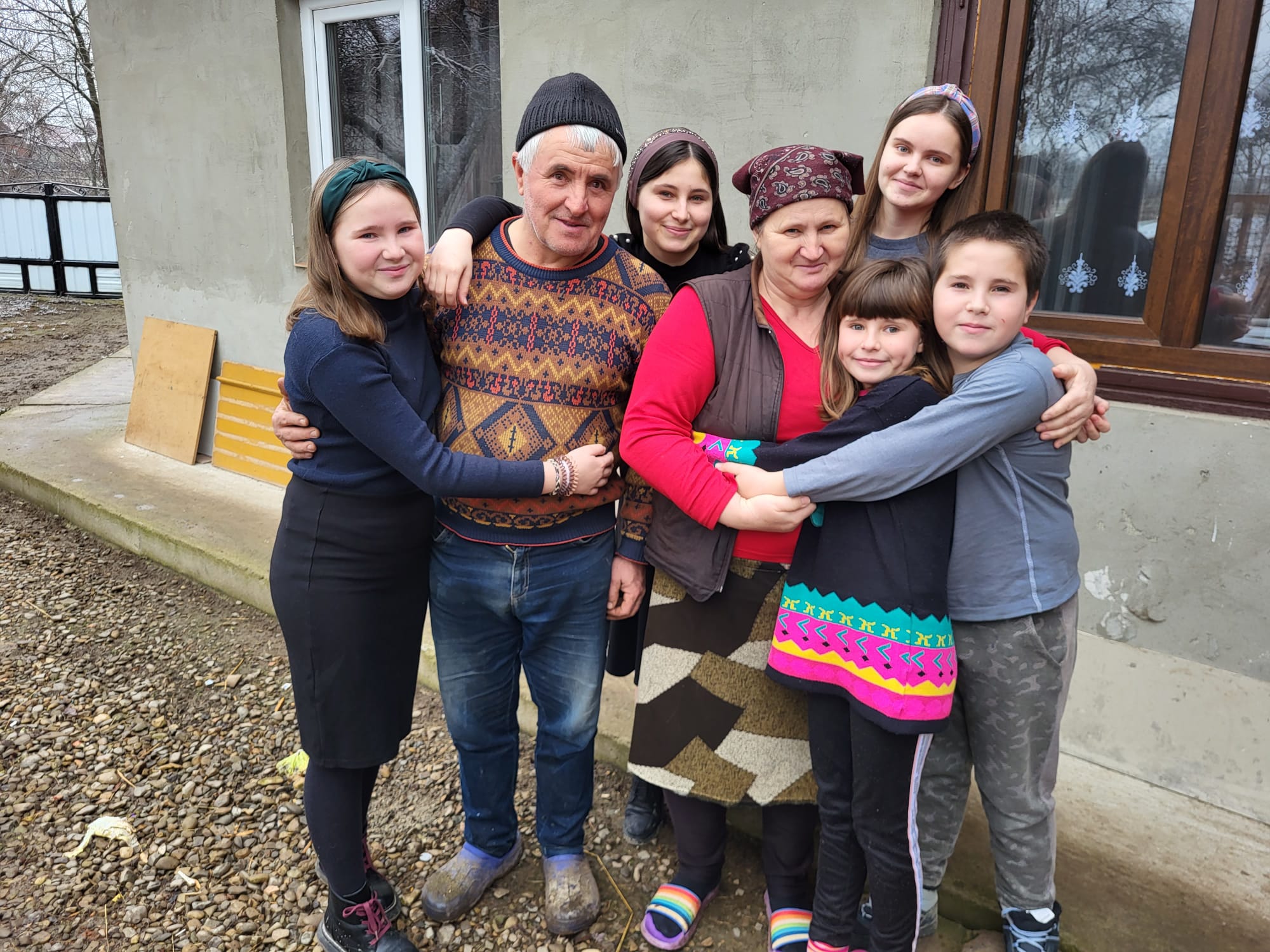Ionut and his family in Romania