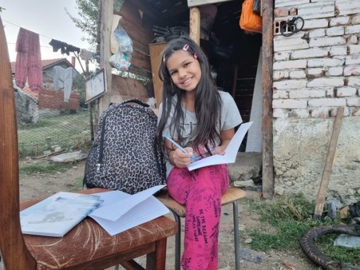 Yamur studying in her backyard in Bulgaria
